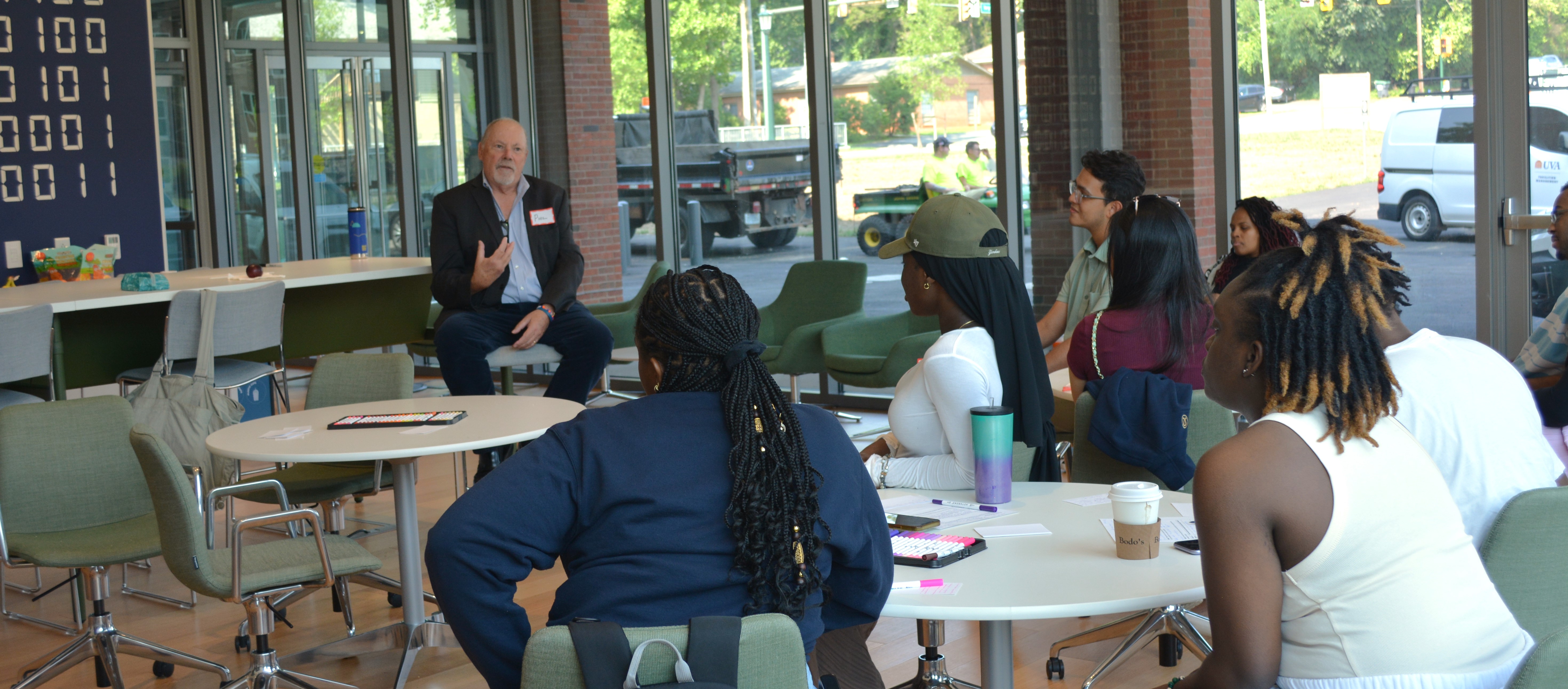 Phil Bourne meets with Data Justice Academy alumni.