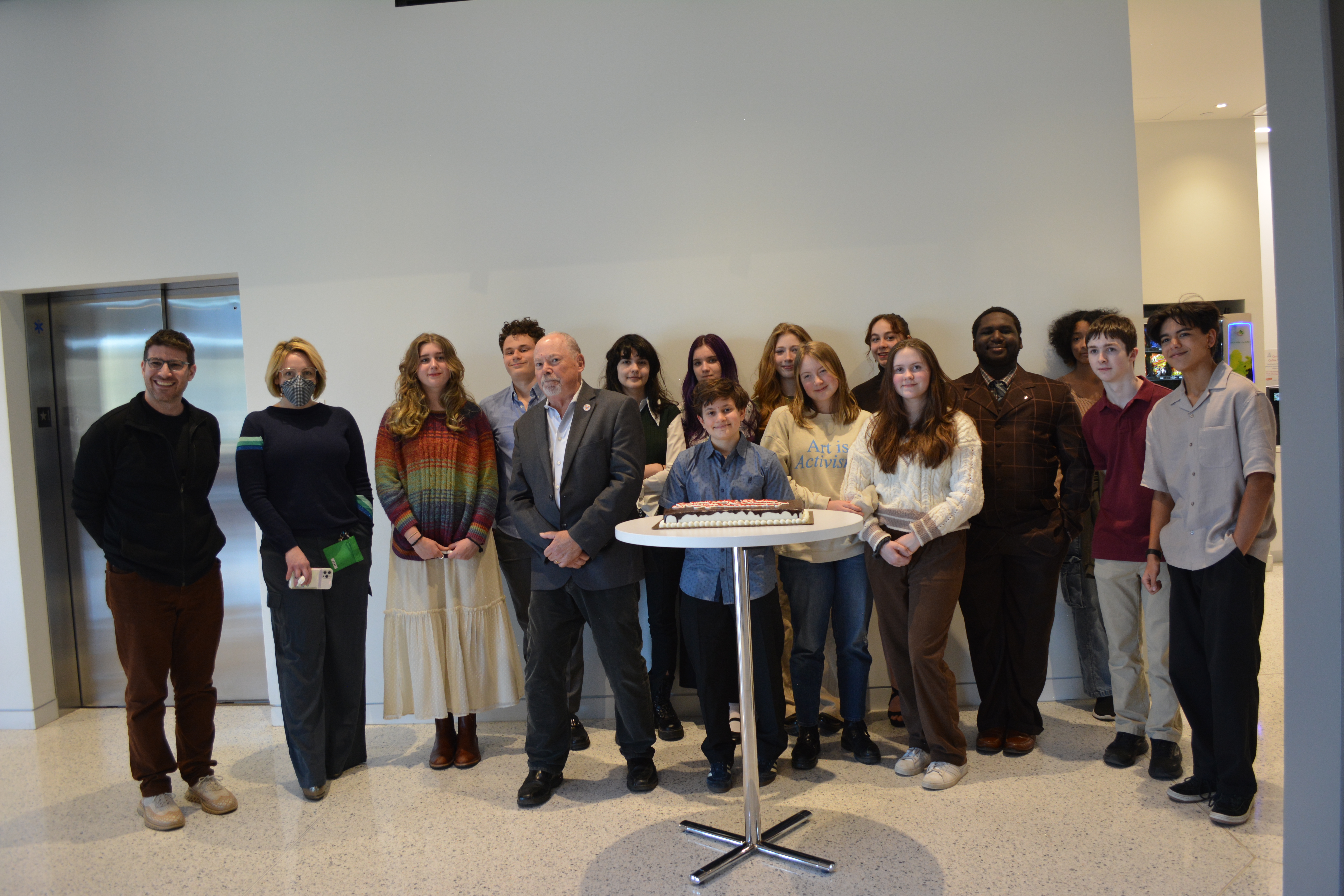 Alex Gates, Mar Hicks, and Dean Phil Bourne pose with presenting students