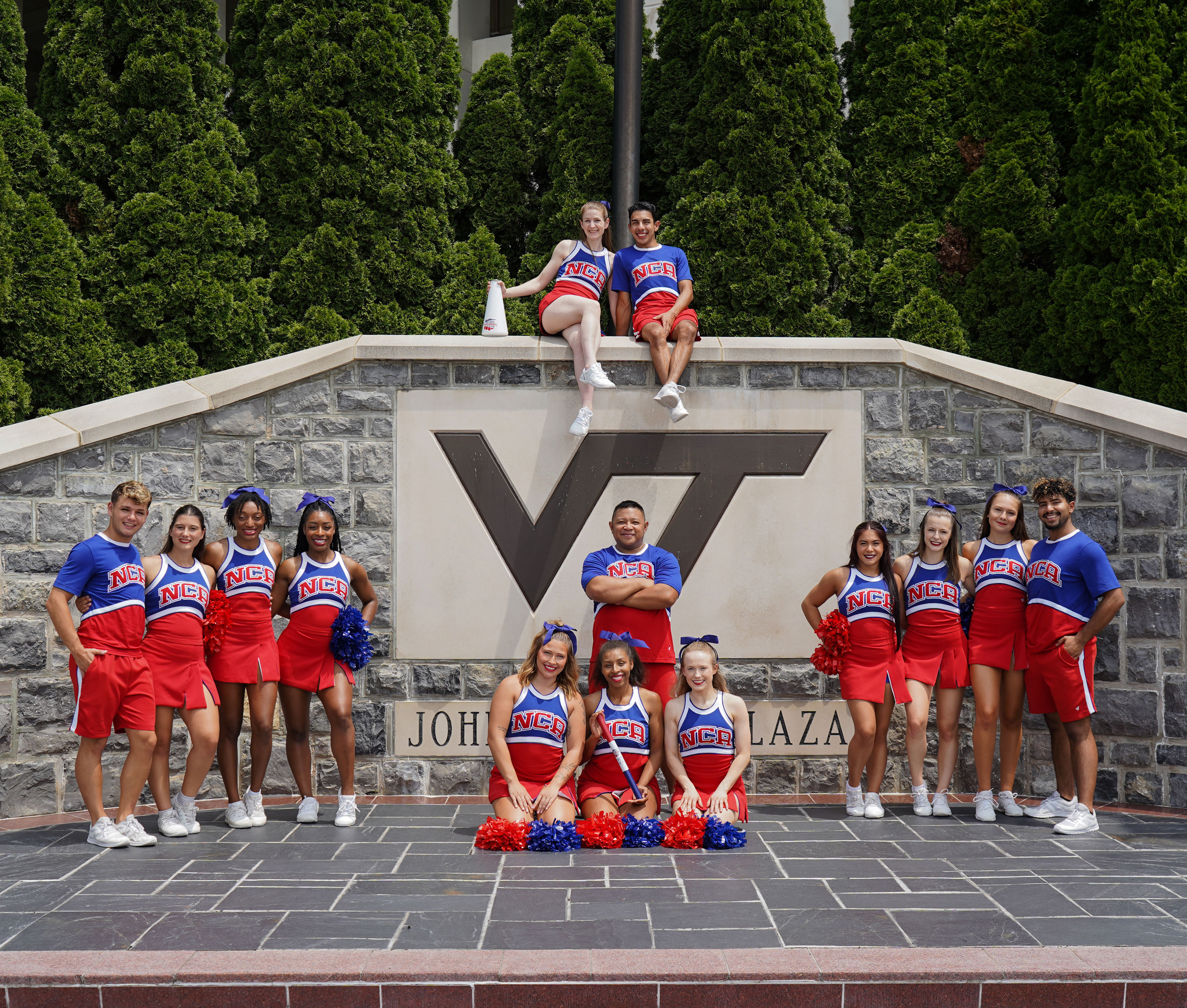 Alyssa Waller and National Cheerleading Association team posing for photo at Virginia Tech