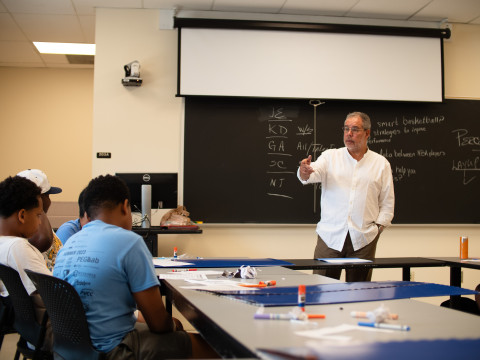 Ed Tapscott talks with students in the Starr Hill program. (Photo by Cody Huff)