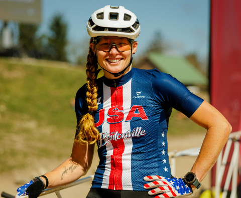 Abigal Snyder in racing gear on her mountain bike before a race