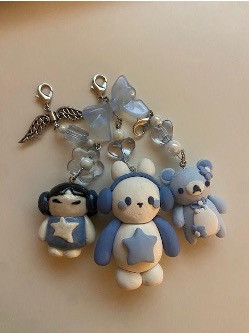 Set of 3 homemade keychains in cute little blue and white designs