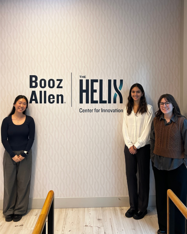 Rachel Seo and friends stand together Booz Allen Hamilton Office.