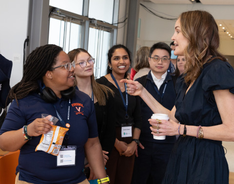 Lexi Reese (right) speaks to attendees following her keynote fireside chat.