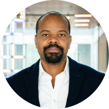 Daniel Graham wearing a dark blazer and white dress shirt