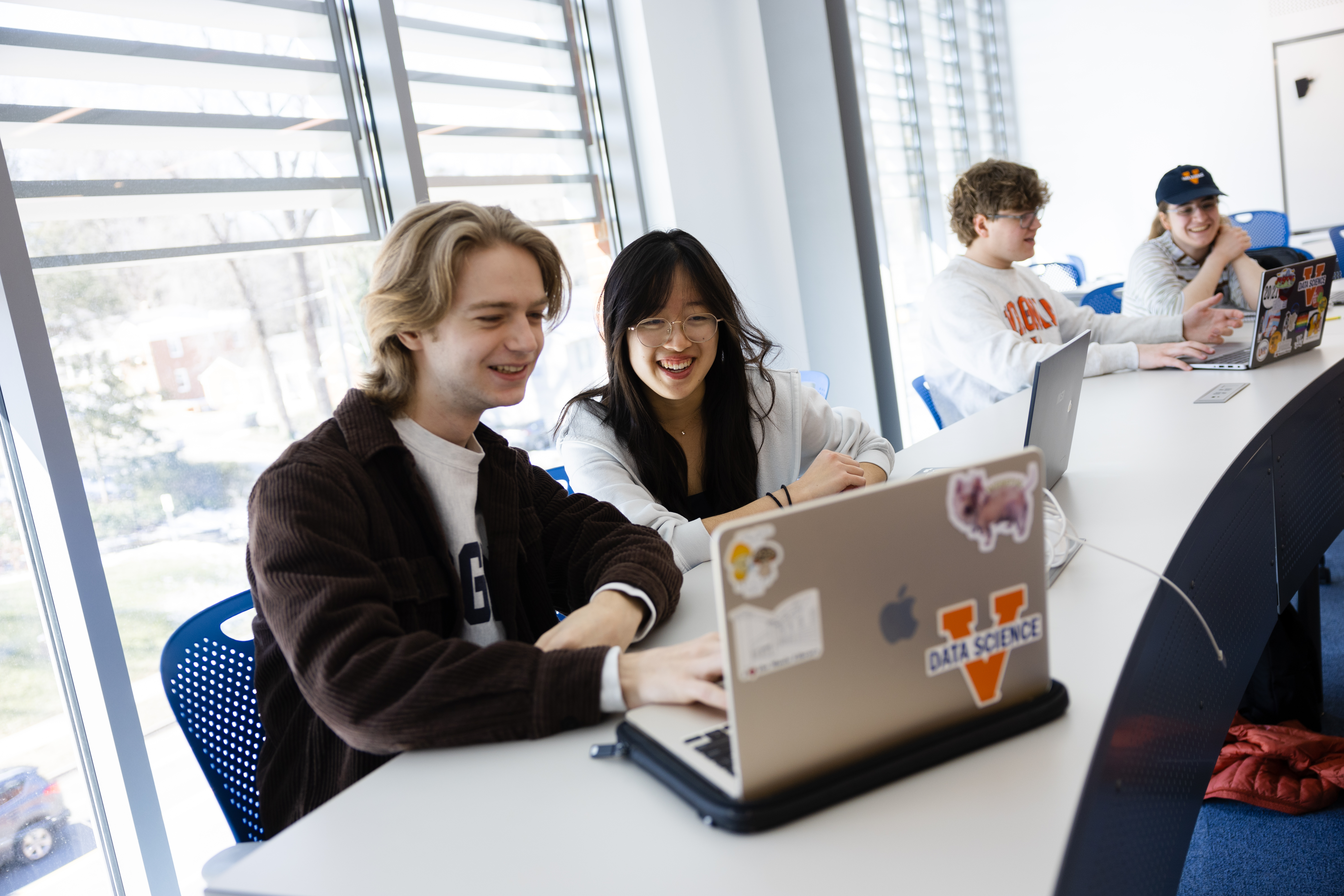 UVA Data Science BSDS Students in classroom at desks looking at laptops