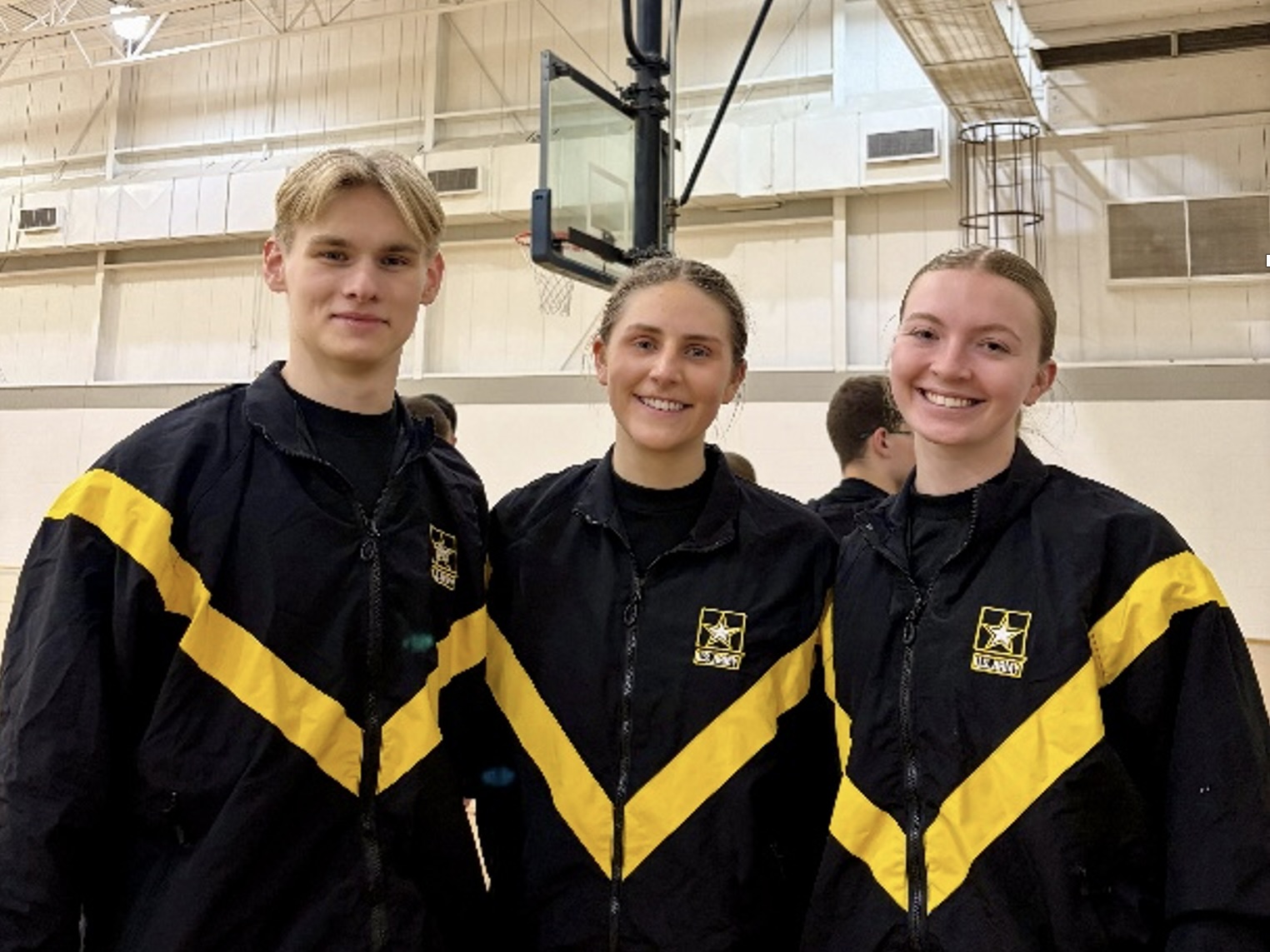 Audrey Stelle and two other members of the University of Virginia's ROTC standing in uniform.
