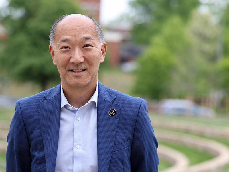 Photo of Professor Ken Ono, dressed in a light blue shirt and dark blue blazer.