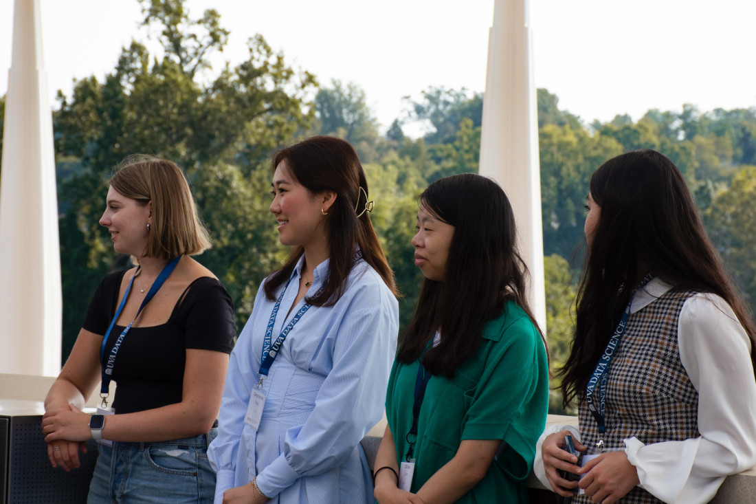 UVA Data Science BSDS female students stand outside together on orientation day