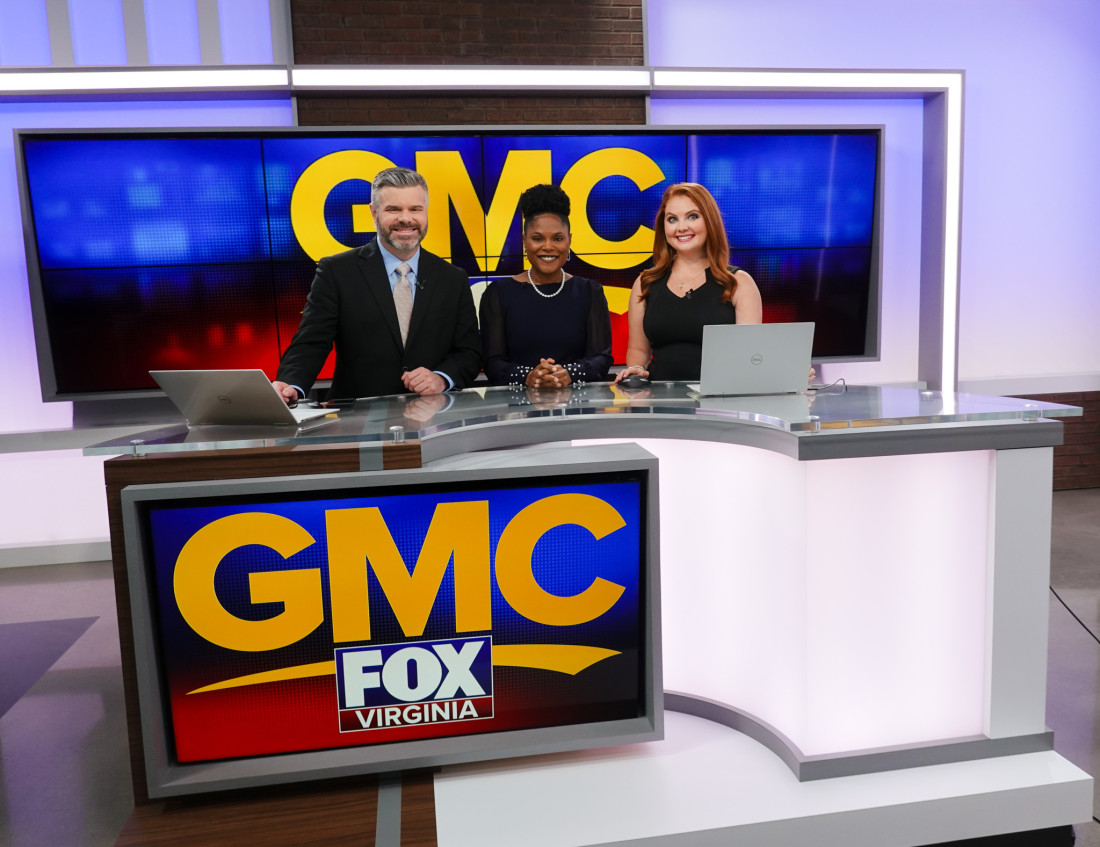 Dr. Jade Preston with two CBS19 anchors at a news desk.