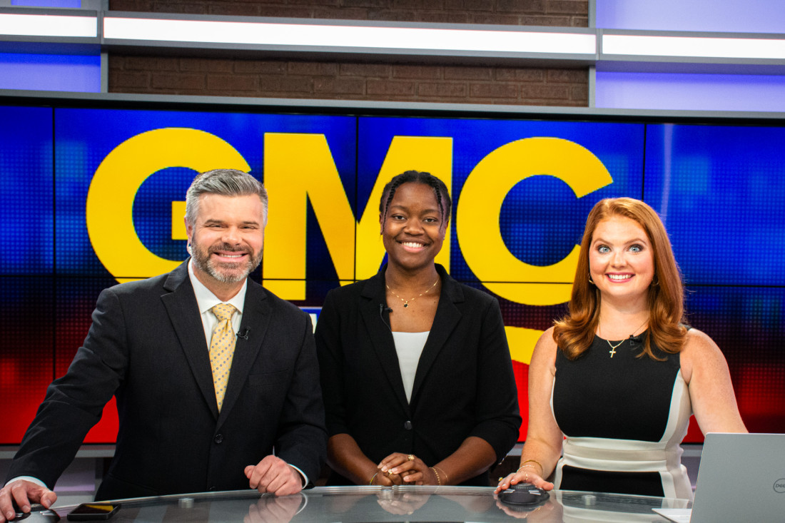 Courtney Hodge poses with two CBS19 news anchors.