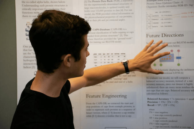 A student pointing to data