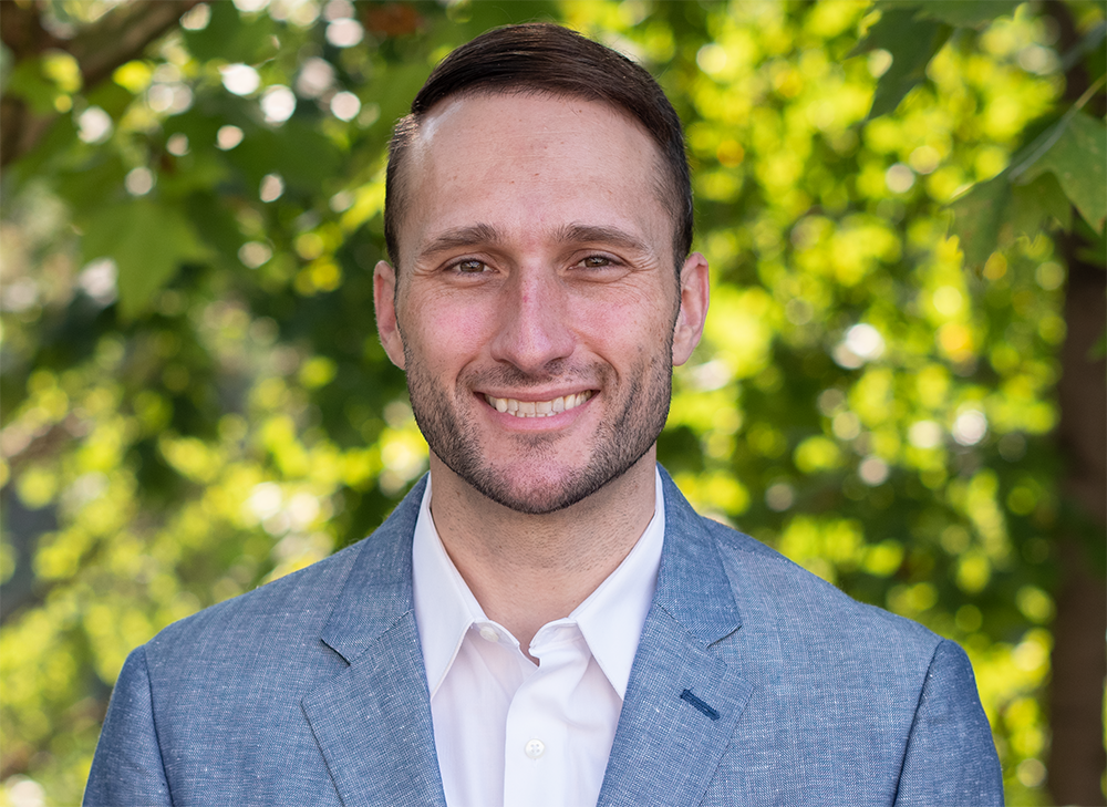 Professor Paul Perrin headshot standing outside