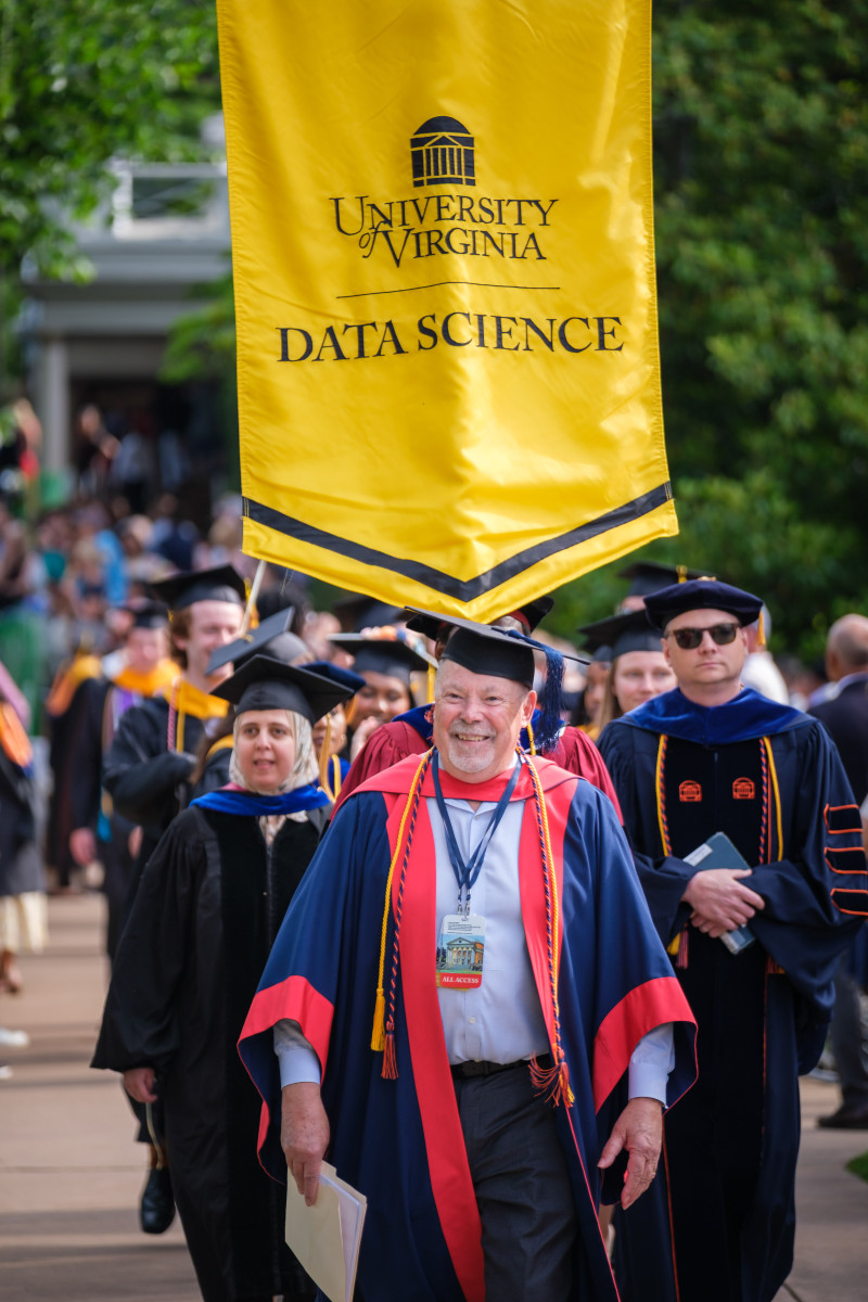 2025 commencement walking the lawn Dean Phil Bourne
