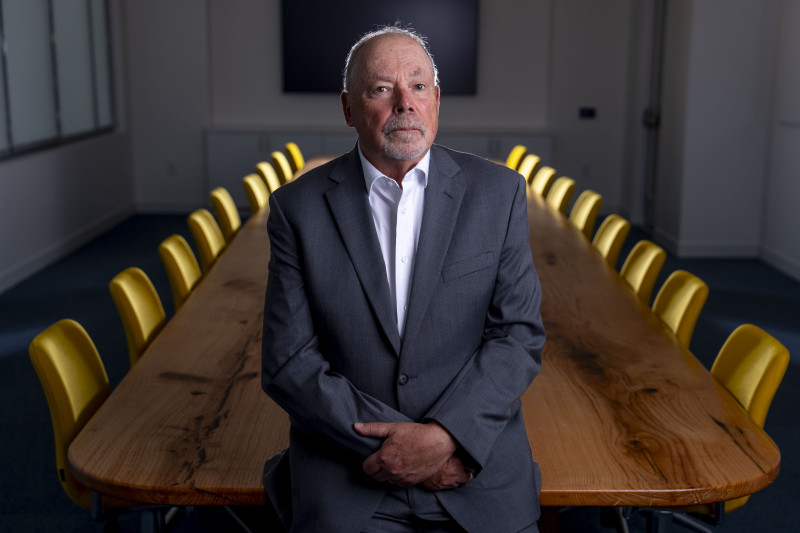 Dean Phil Bourne at conference room table