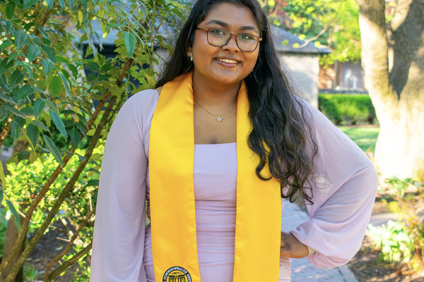 UVA Data Science MSDS student Riya Pulla in lavender dress with VCU graduation stoll