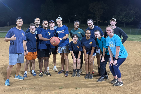 UVA Data Science MSDS residential cohort 2025 standing together posing for a pic after kickball game