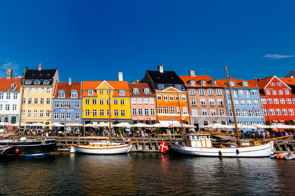 Copenhagen Denmark river canal scene of colorful buildings 