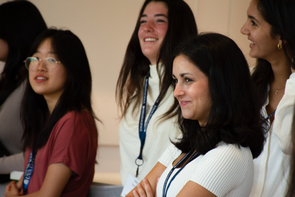 UVA Data Science BSDS first class group of young women at orientation, standing together smiling and laughing